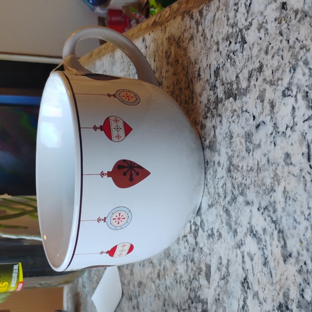 Designpac 6 Inch Oversized Holiday mug with (red, brown, and blue) ornaments.